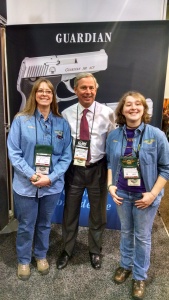 Colleen Kimble (L) and Logan Kimble-Lee (R) with Sandy Chisholm (C) owner of North American Arms - friend and supporter of 4-H Shooting Sports .
